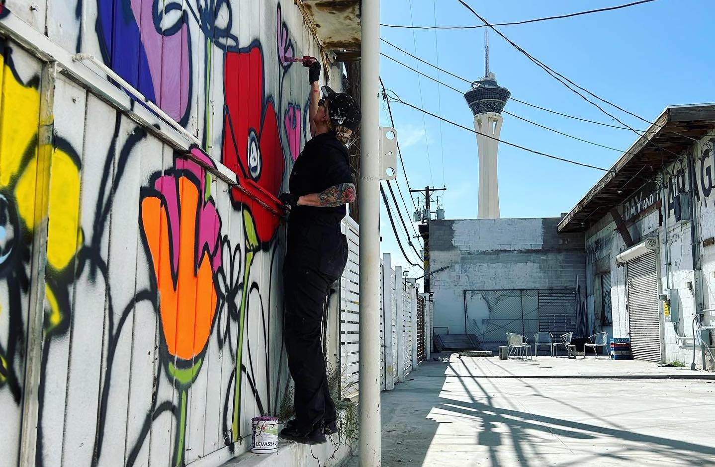 Janel Raihl, creating mural called the 'Garden' at Voodoo Brewery Las Vegas.