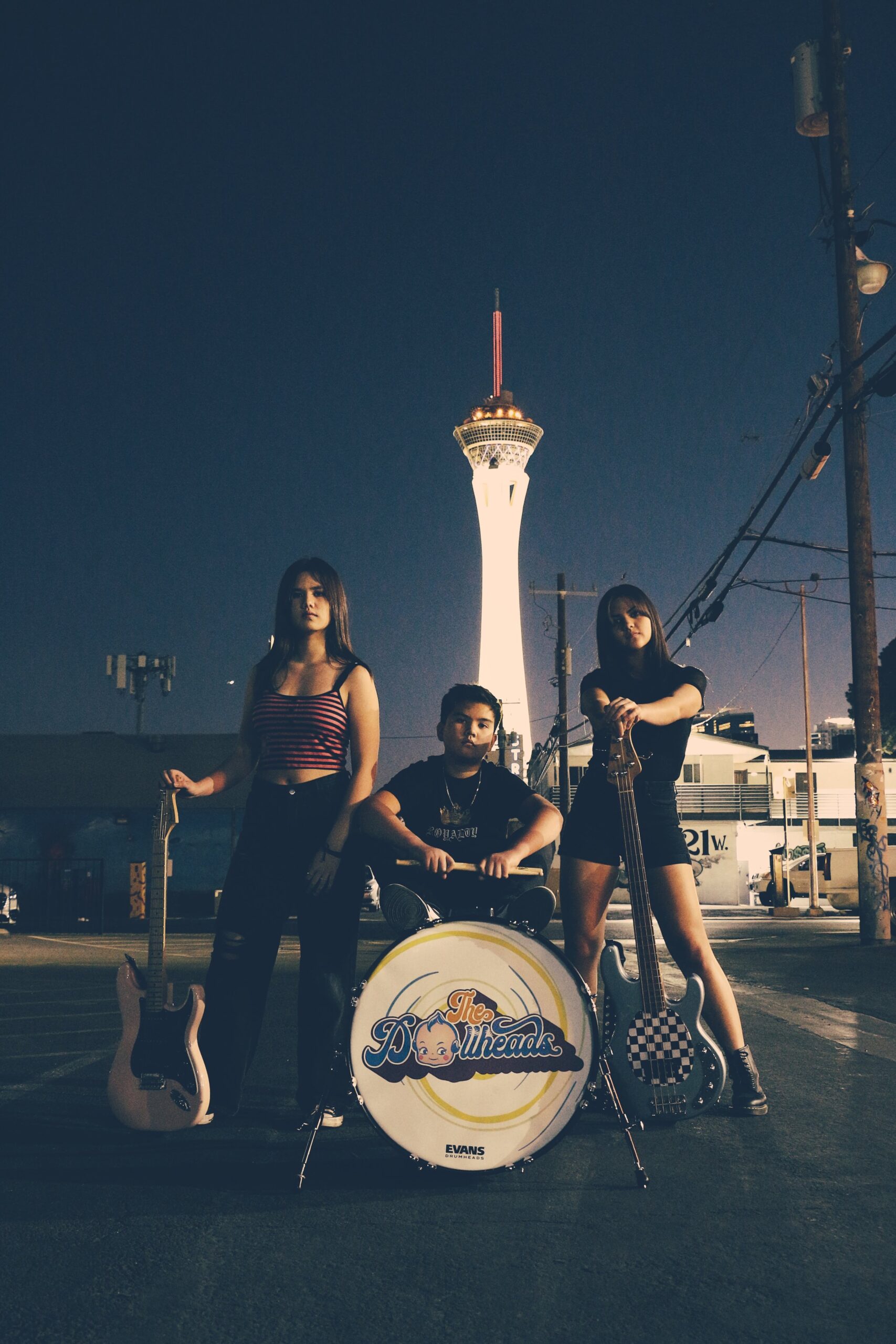 The Dollheads by Chey Mansfield. On main street in the arts district of Las Vegas holding instruments.